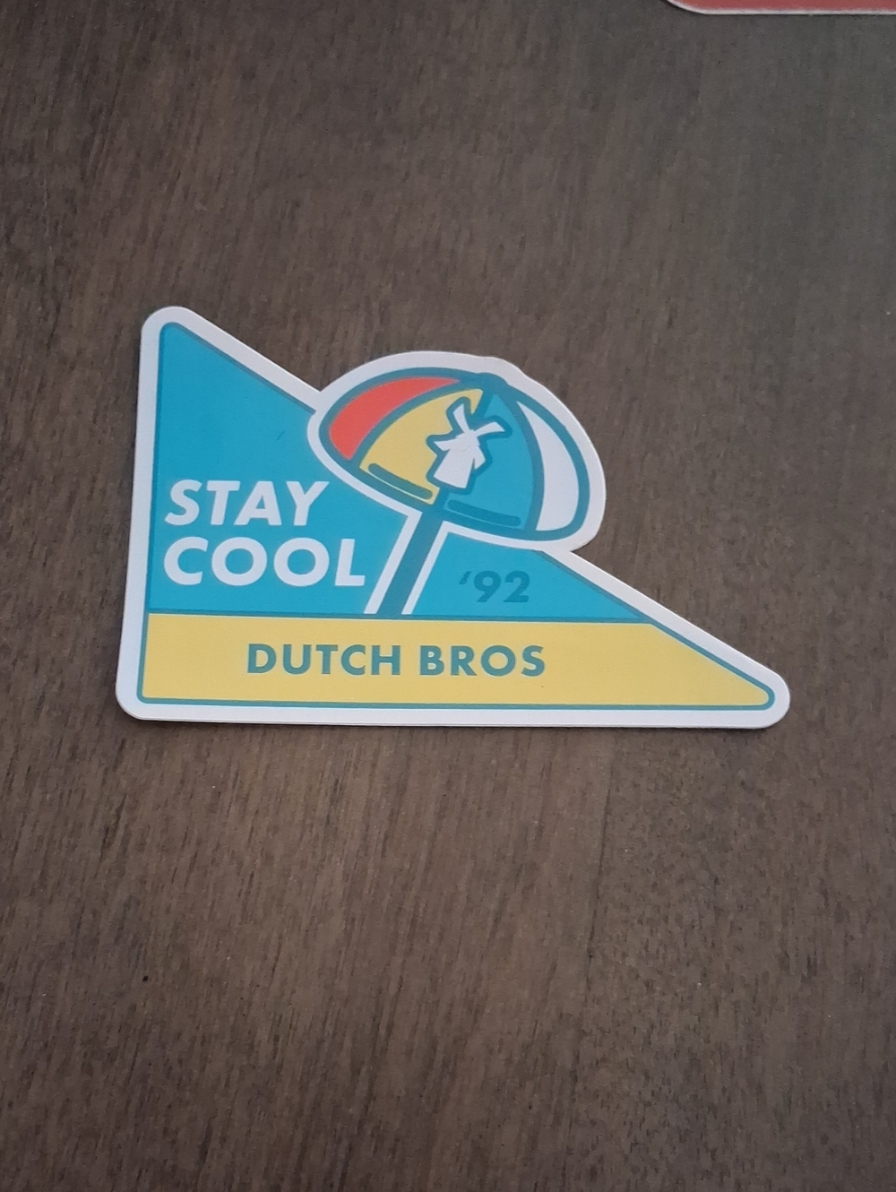 Dutch Bros Triangular 'Stay Cool' Sticker - Turquoise, Yellow & Red Accent